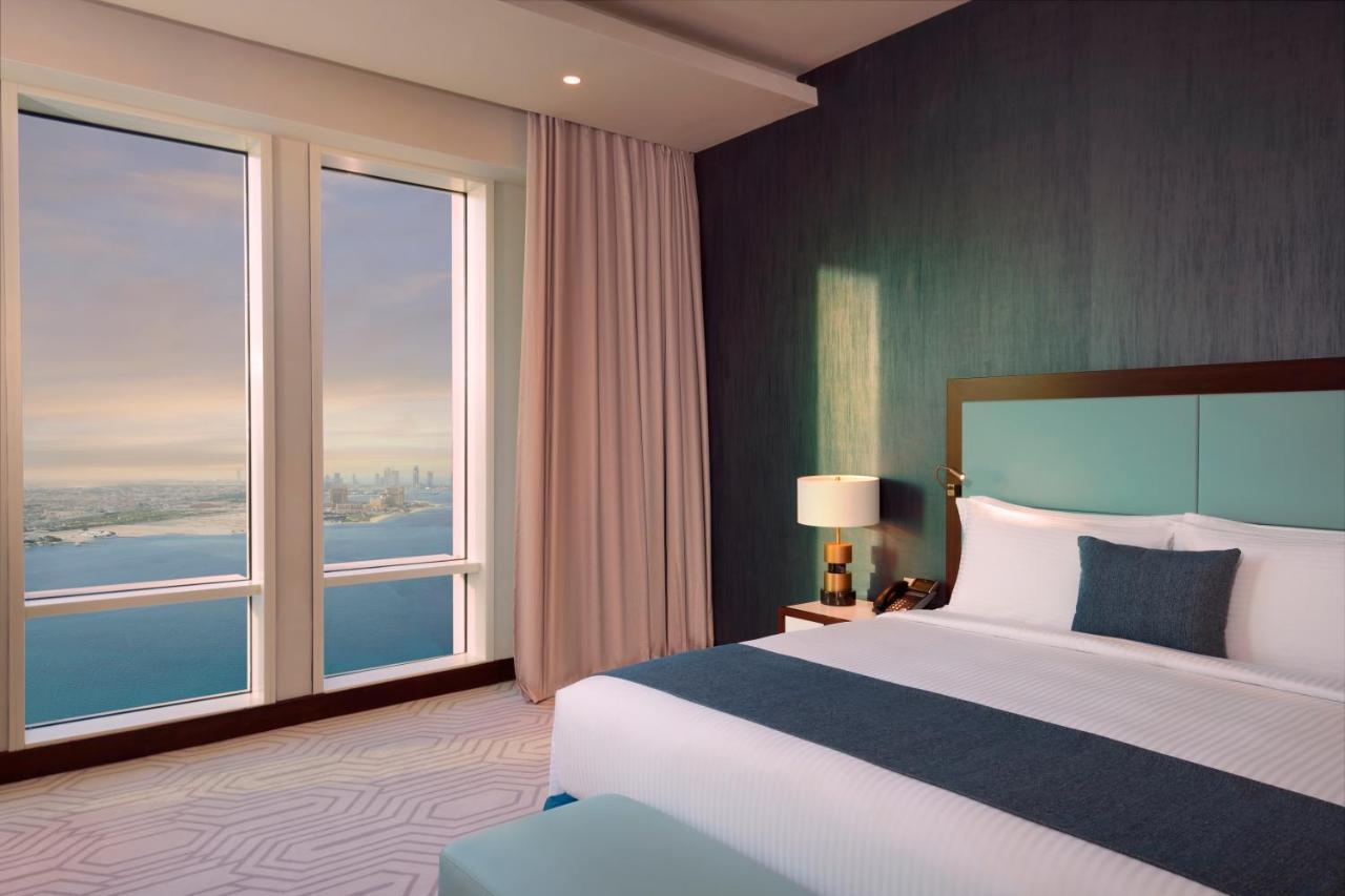 Wyndham Grand Doha West Bay Beach Екстер'єр фото A bedroom at the Address Downtown Dubai