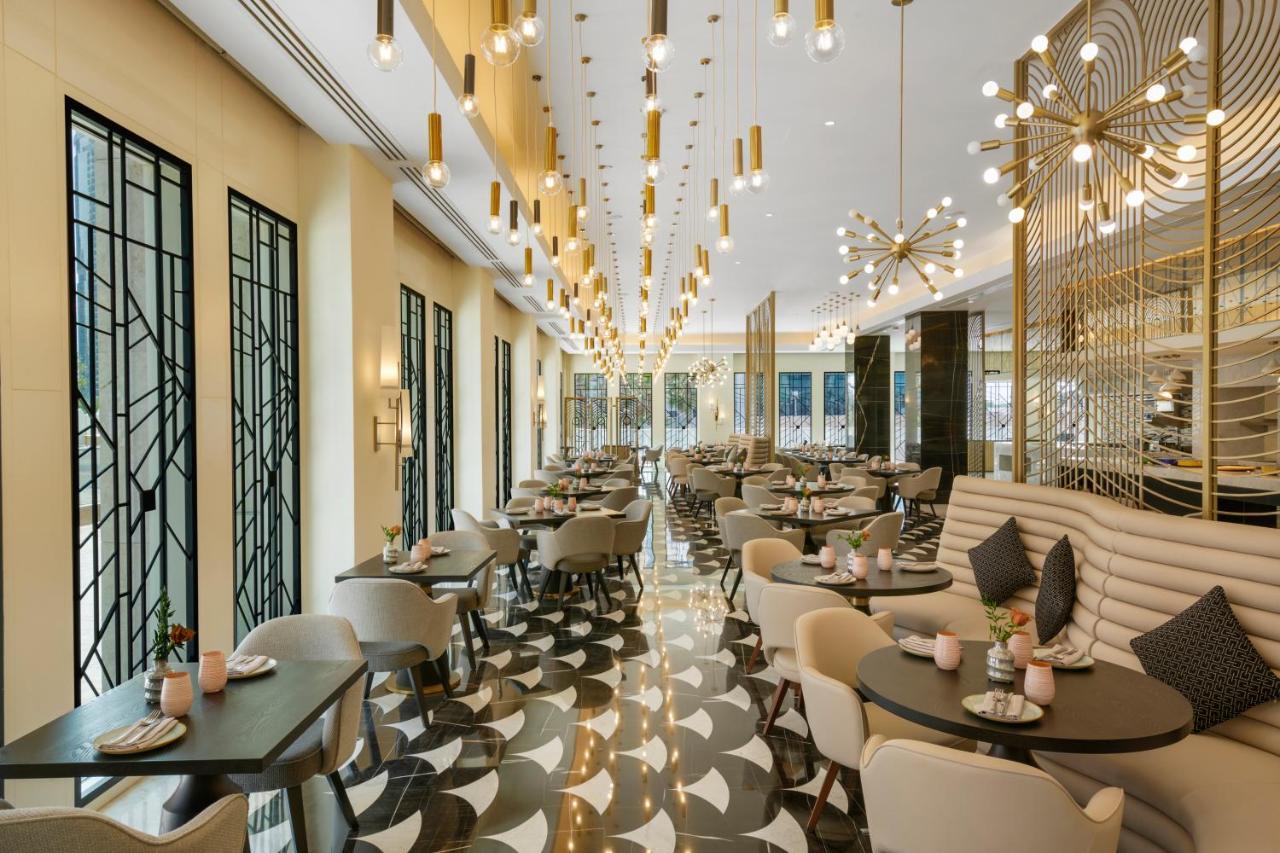 Wyndham Grand Doha West Bay Beach Екстер'єр фото The restaurant