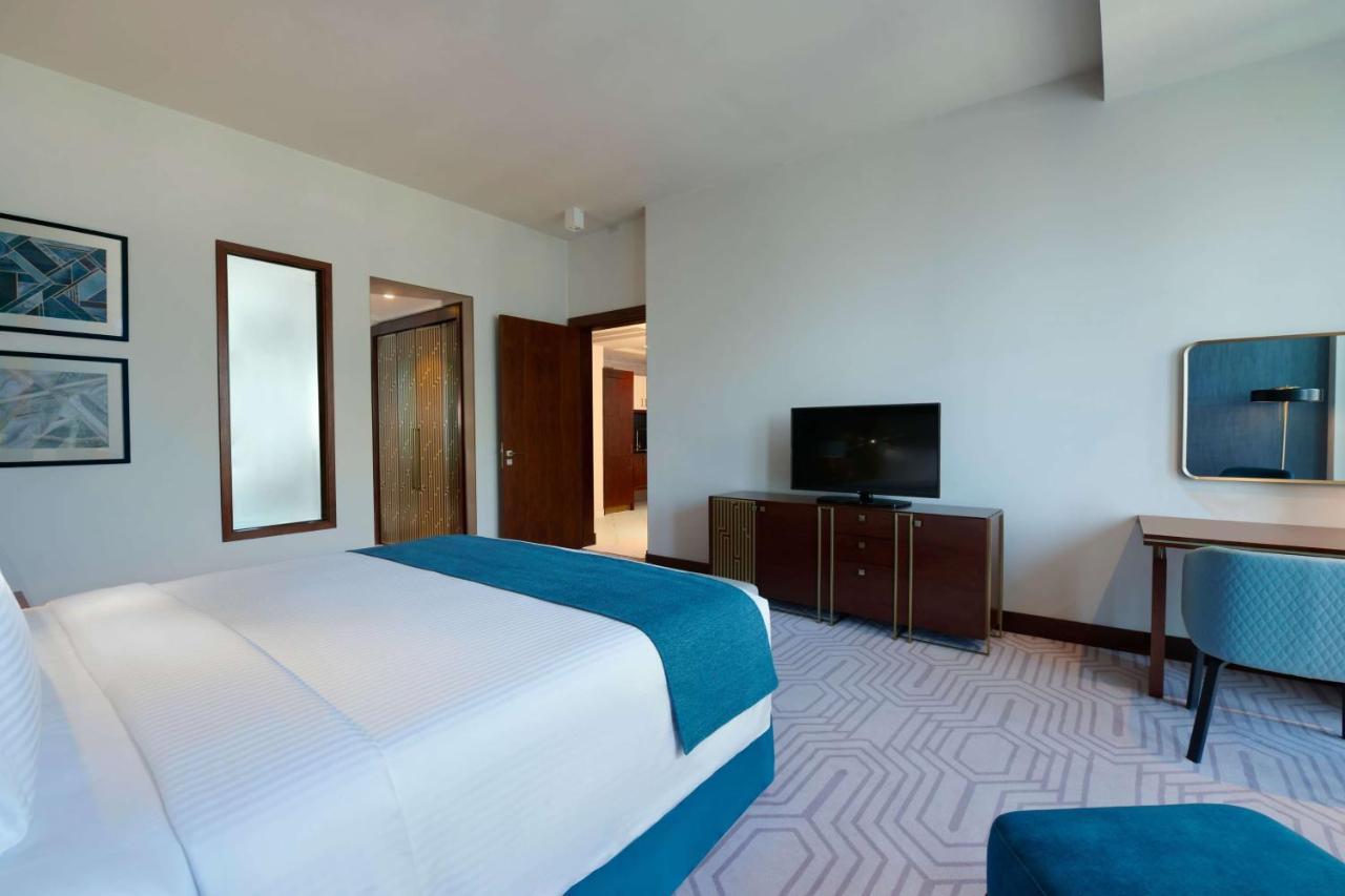 Wyndham Grand Doha West Bay Beach Екстер'єр фото A bedroom at the hotel